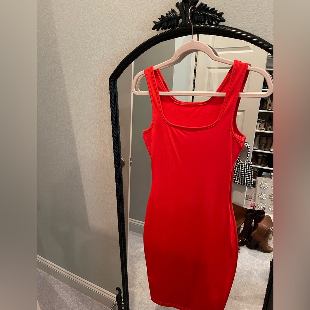 Bodycon dress,redorange, midi length lower back, cinched waist,stretchy material
